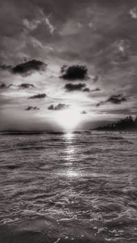 Captivating black and white sunset over the ocean in Lázaro Cárdenas, Mexico.