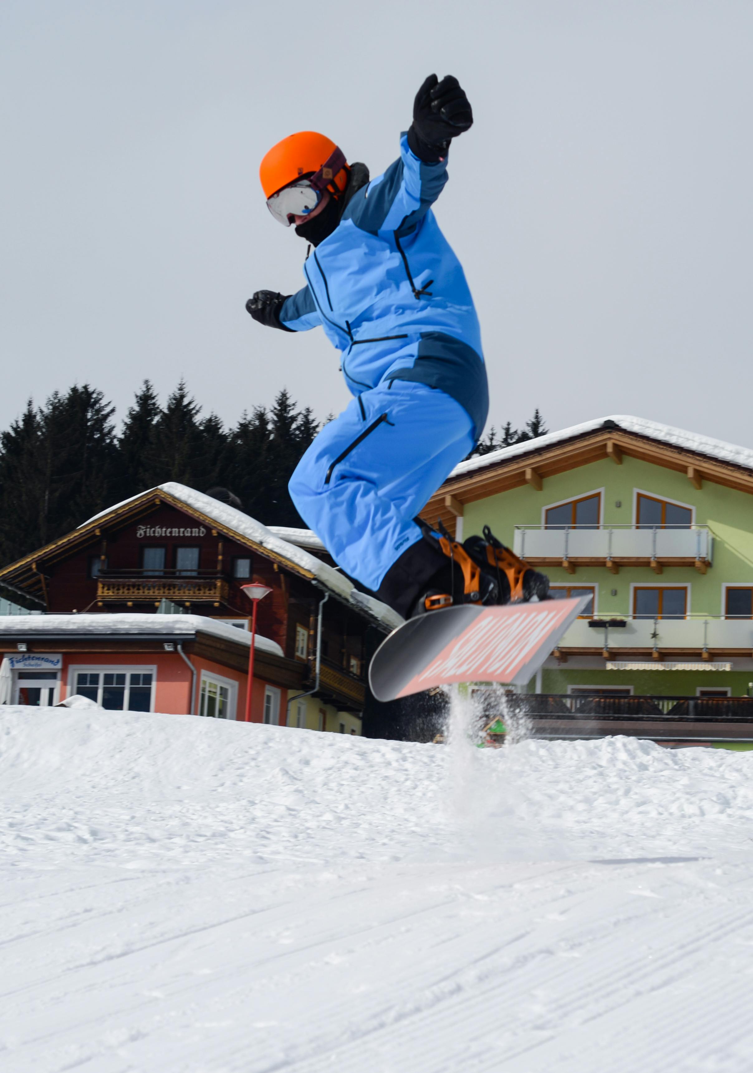 person doing snowboarding free