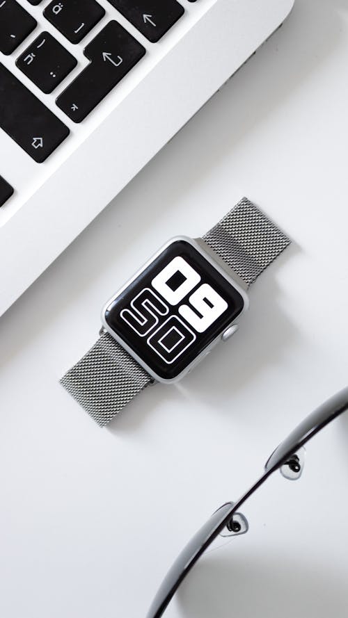 Free Smartwatch on a White Surface Stock Photo