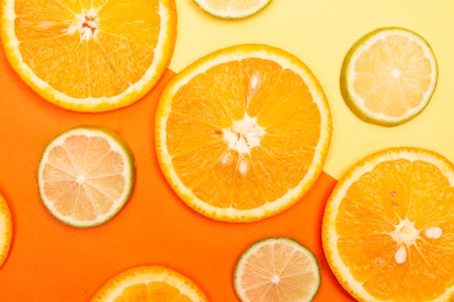 Orange Slices on Orange Background