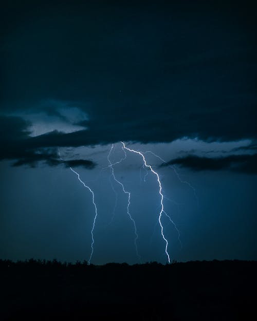 Free Lightning Strike in the Night Sky Stock Photo