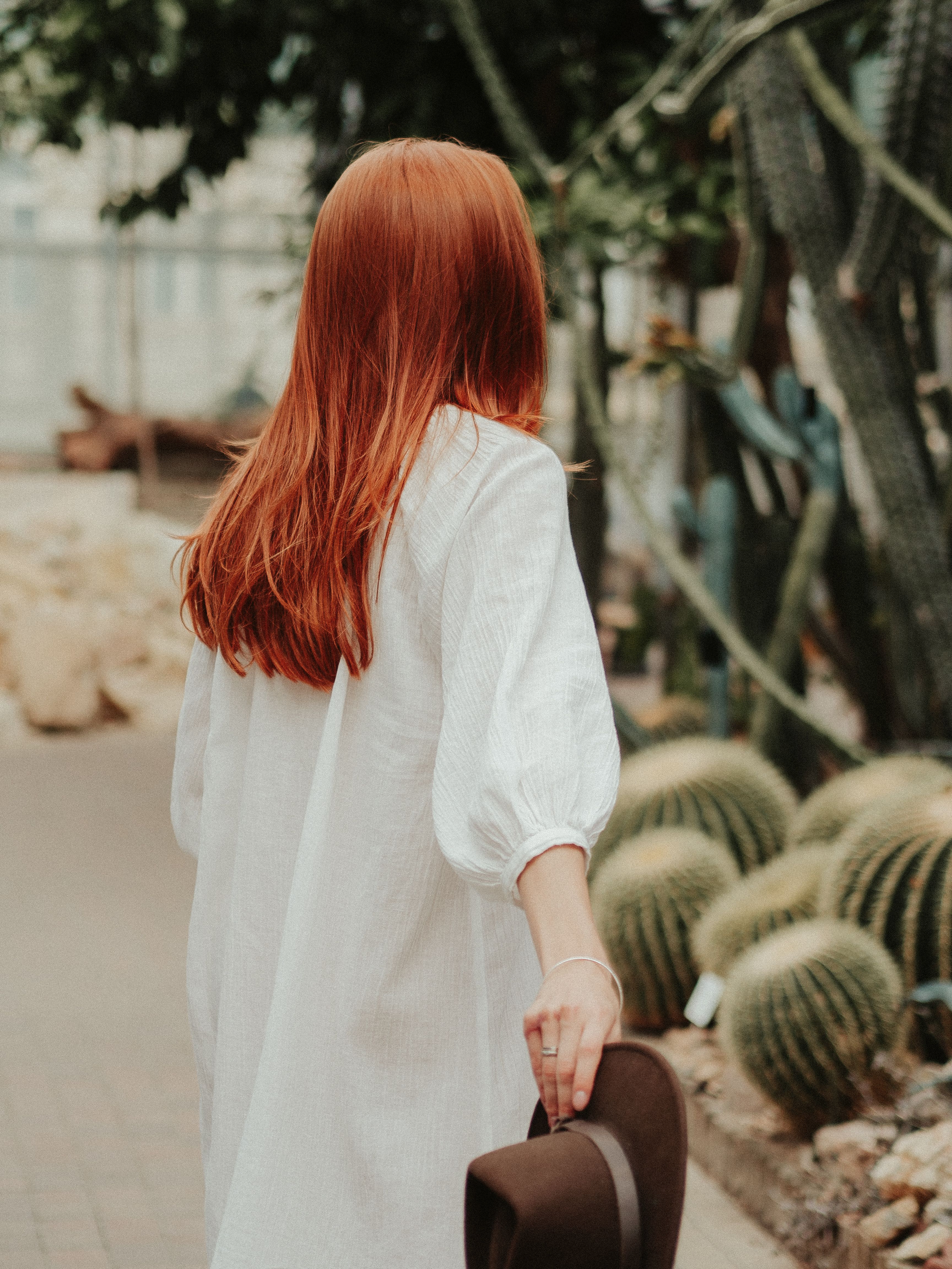 A Woman in White Long Sleeve Dress · Free Stock Photo