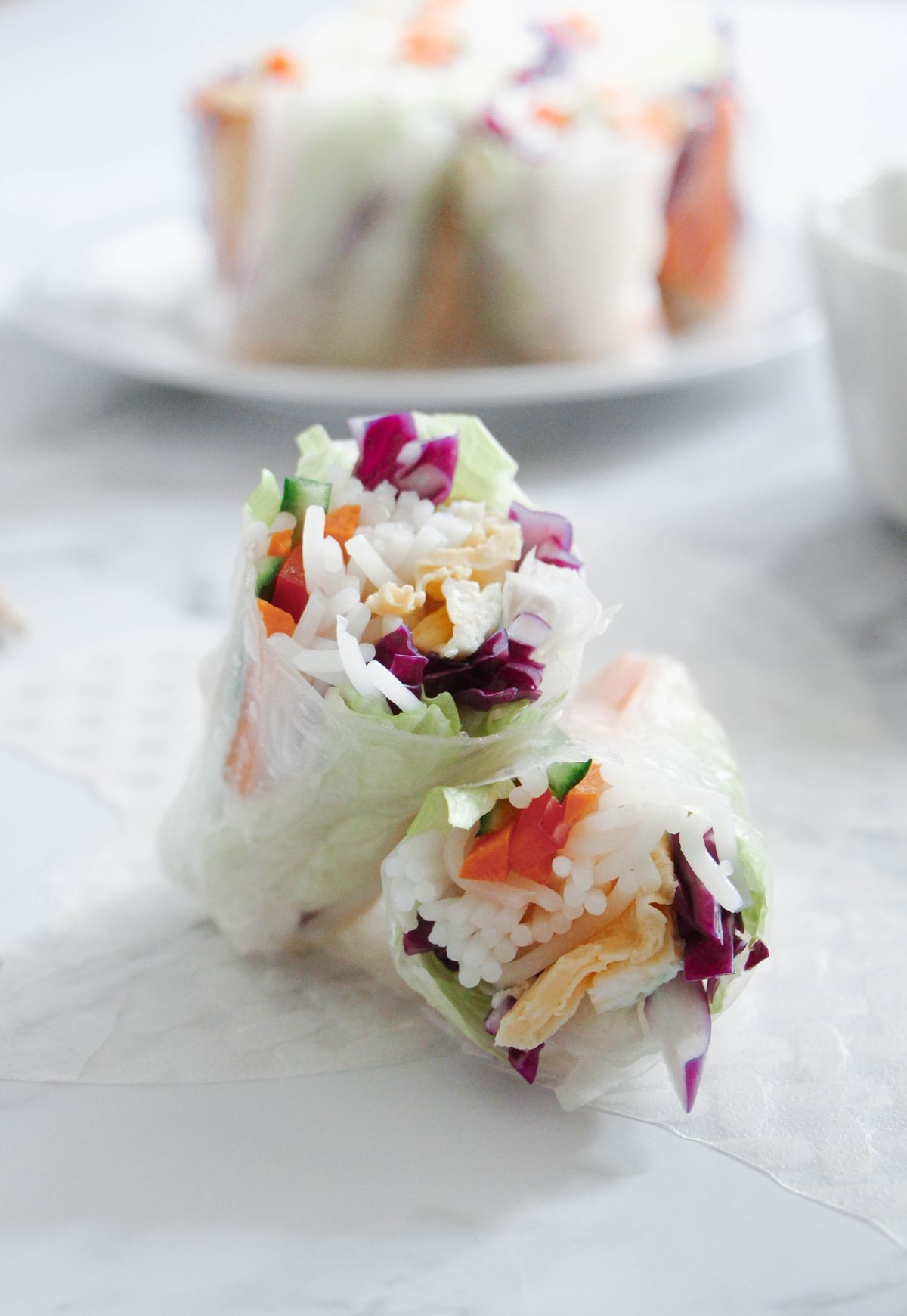 Vegetable rice-paper rolls with noodles and colorful fresh fillings