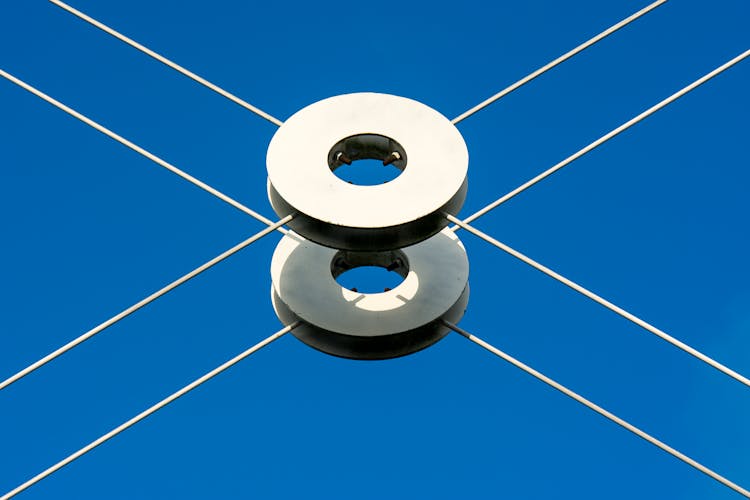 Metal Circular Plates On Blue Background