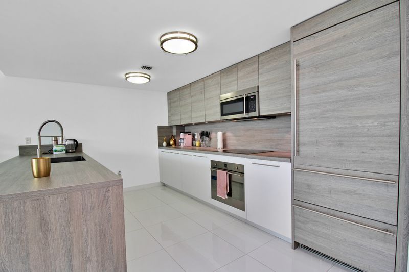 Refined renovated home interior designed by Studio Miel in Miami, FL
