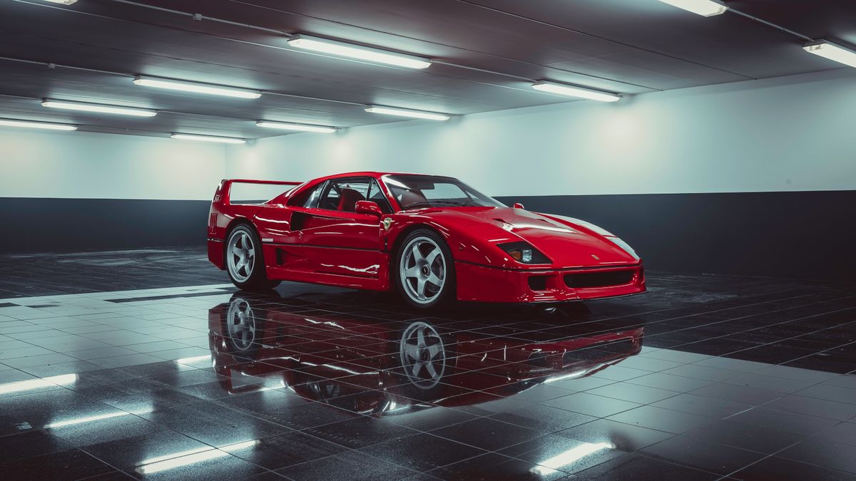 Red Ferrari sports car displayed indoors