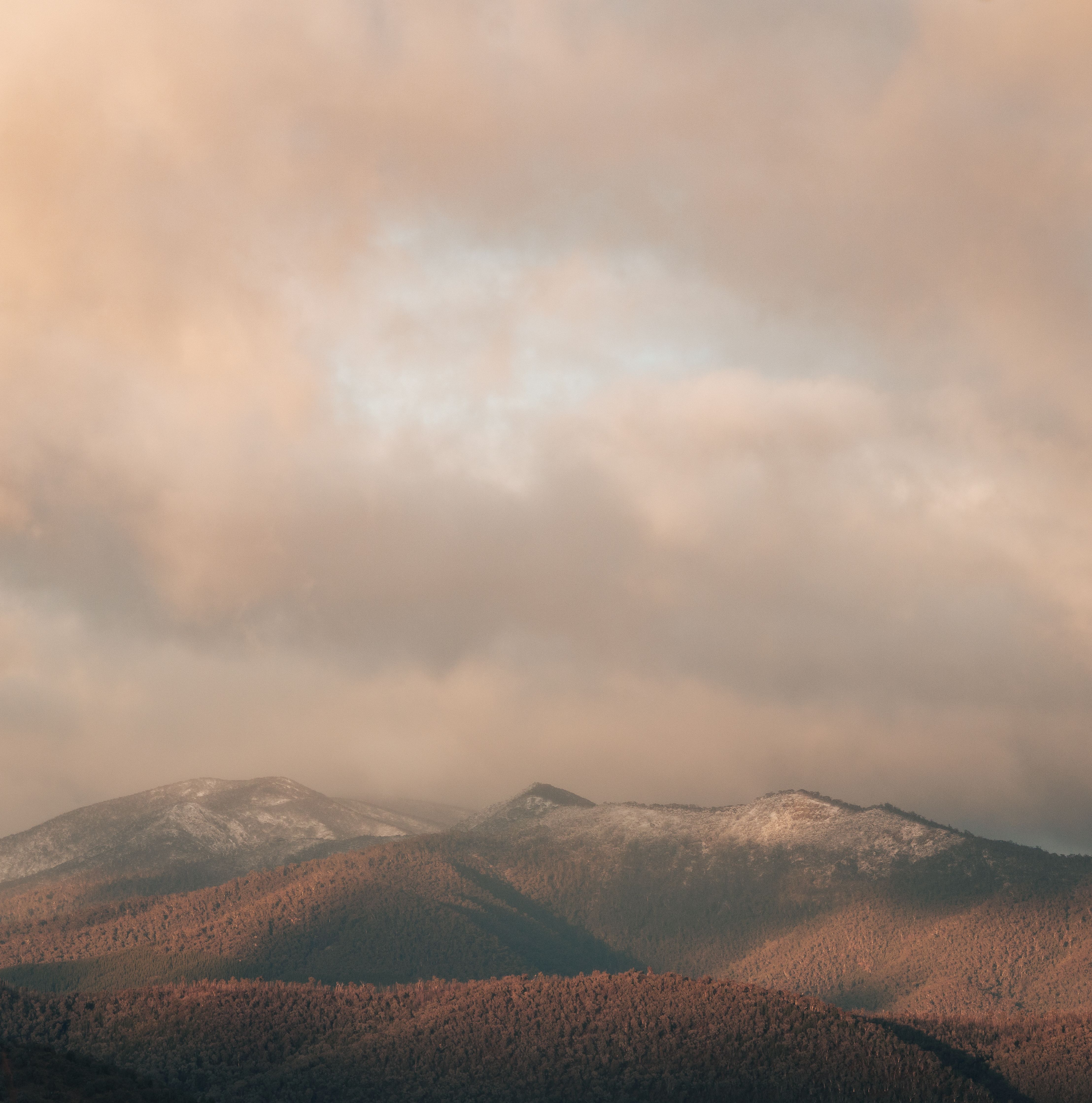 Snow Covered Mountains Under White Cloudts · Free Stock Photo