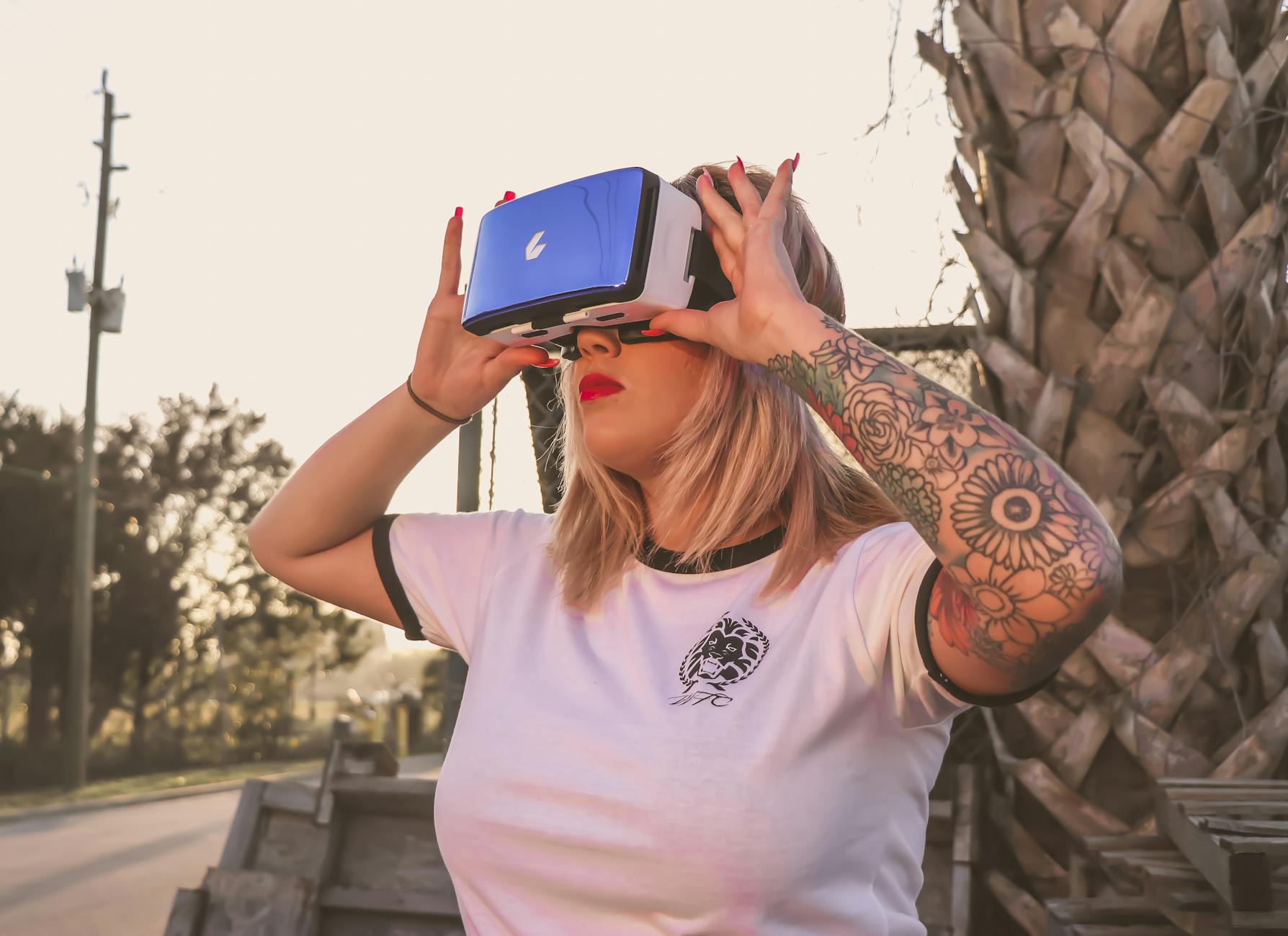 Woman wearing a VR glasses and playing lone echo game