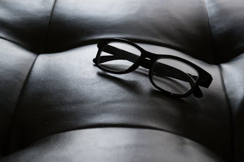 Free Close-Up Photography of Black Frame Eyeglasses Stock Photo