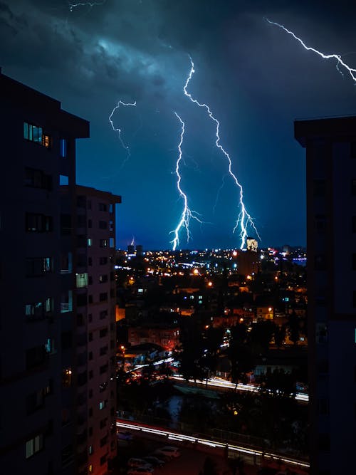 Lightnings Near City Buildings 