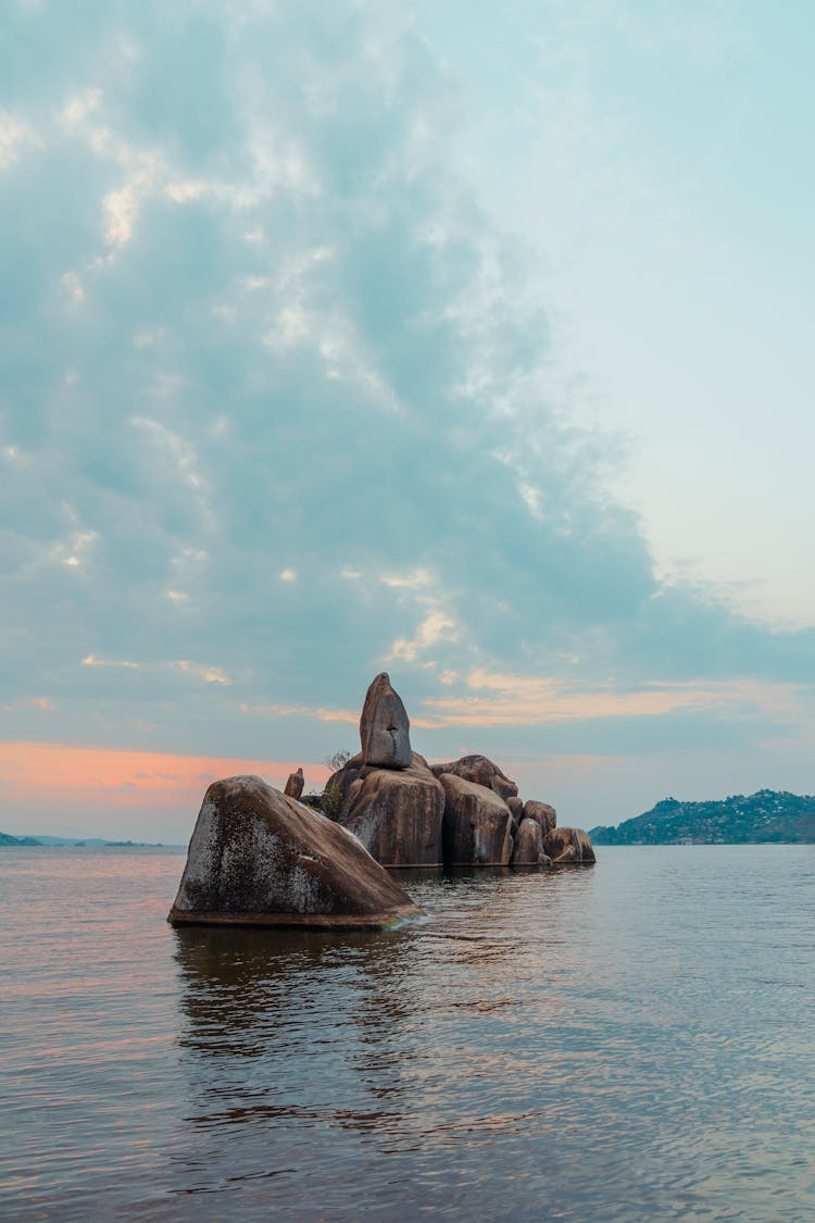 Scenic View Of A Rock Formation In The Sea