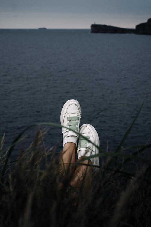 Free A Person Wearing White Sneakers Stock Photo