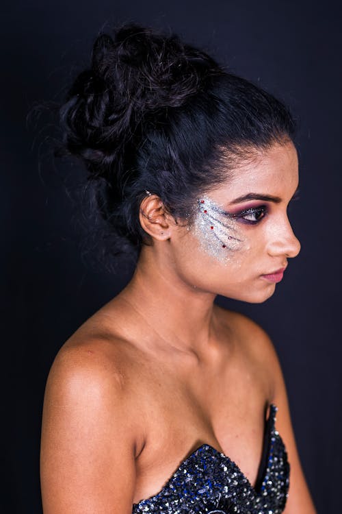 Free Woman in Blue Tube Top with Art Makeup Stock Photo