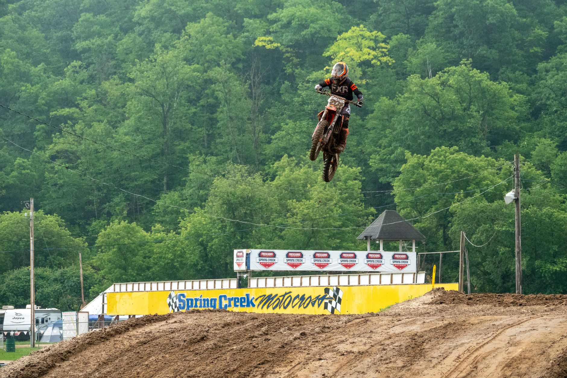 A thrilling motocross jump captured at Spring Creek Raceway in Millville, Minnesota.