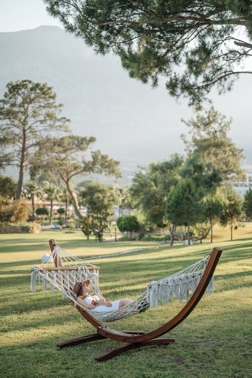 Free A Woman Lying on the Hammock Stock Photo