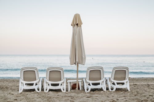Chairs and an Umbrella in the Beach