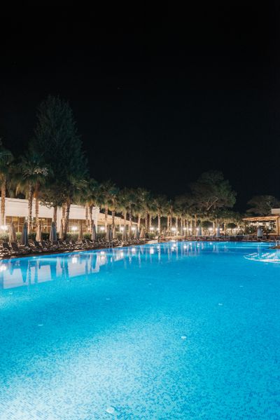 Resort pool at night by Pavel Danilyuk on Pexels