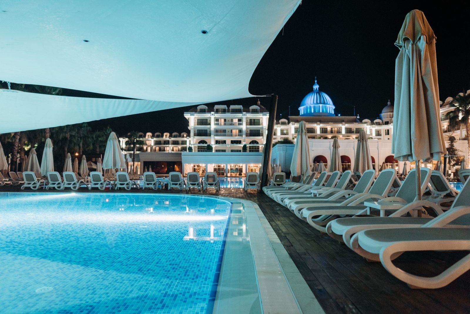 Pool deck lit at night