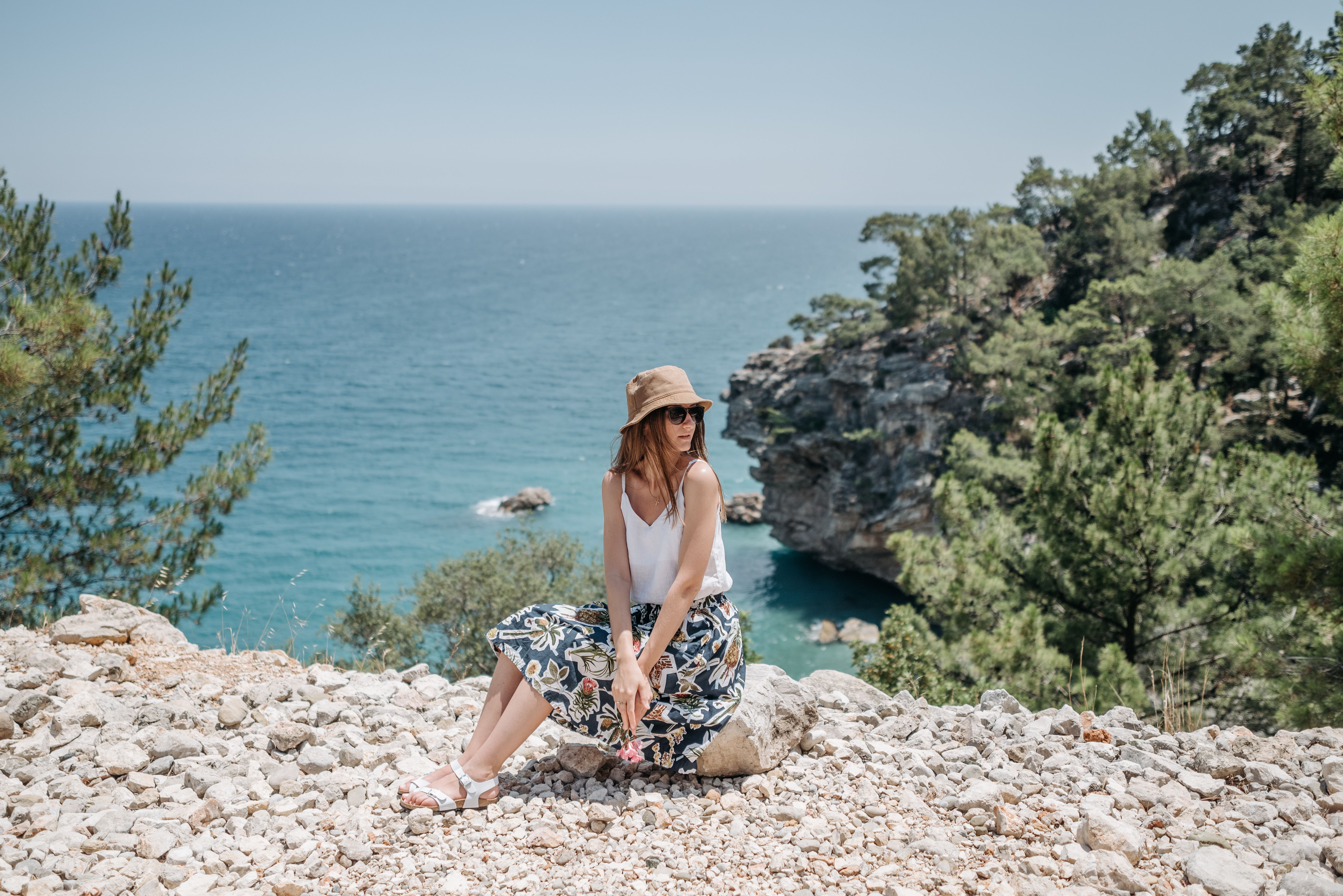 A Woman Sitting on the Rock · Free Stock Photo