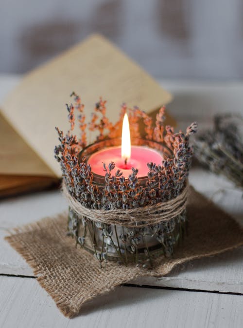 Close-up Photo of Lighted Candle 