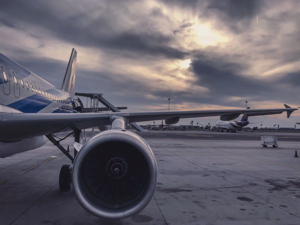 Airport departure hall — where last-minute deals require fast action