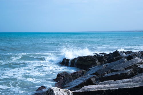 Black Rock Natural Formation Front of Sea