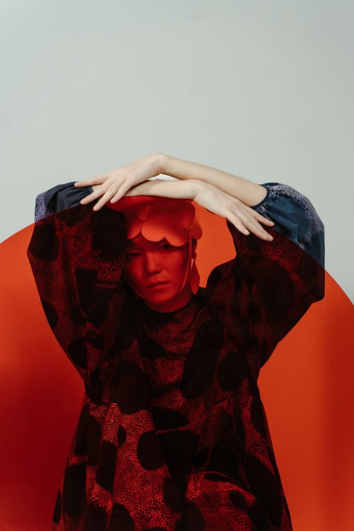 Free Artistic portrait of a model in colorful conceptual fashion posing indoors. Stock Photo