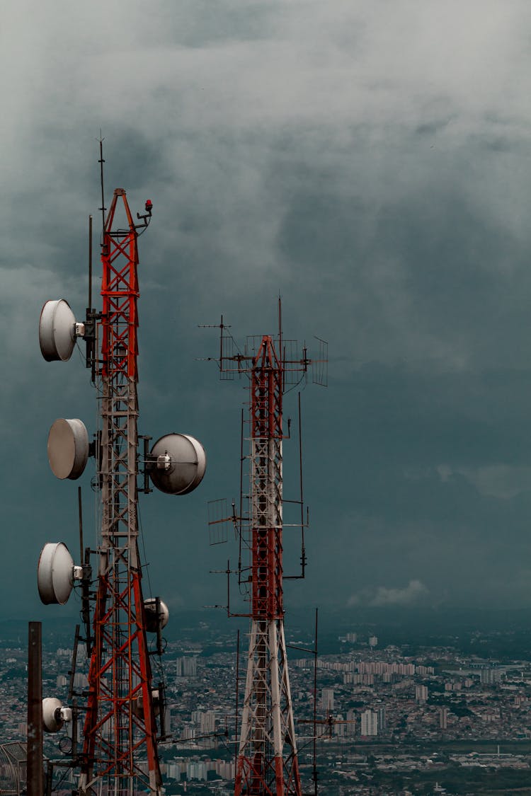 Network Towers Under Gloomy Sky 