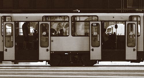 Grayscale Photo of Train on Rail