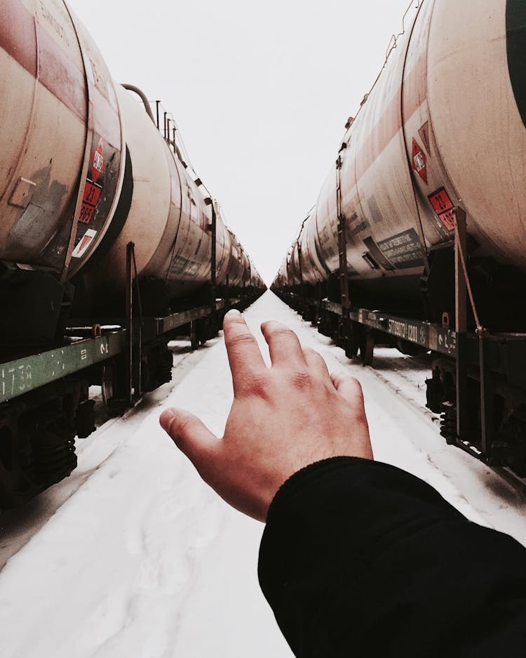 Hand Between Fuel Tanks 