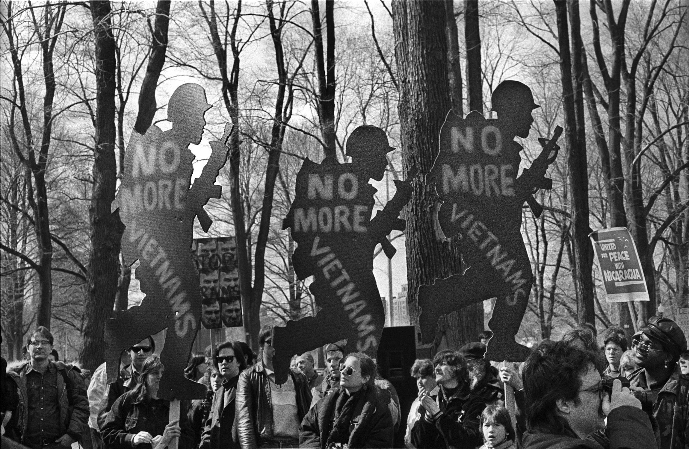 Grayscale Photo of People Protesting Near the Trees · Free Stock Photo