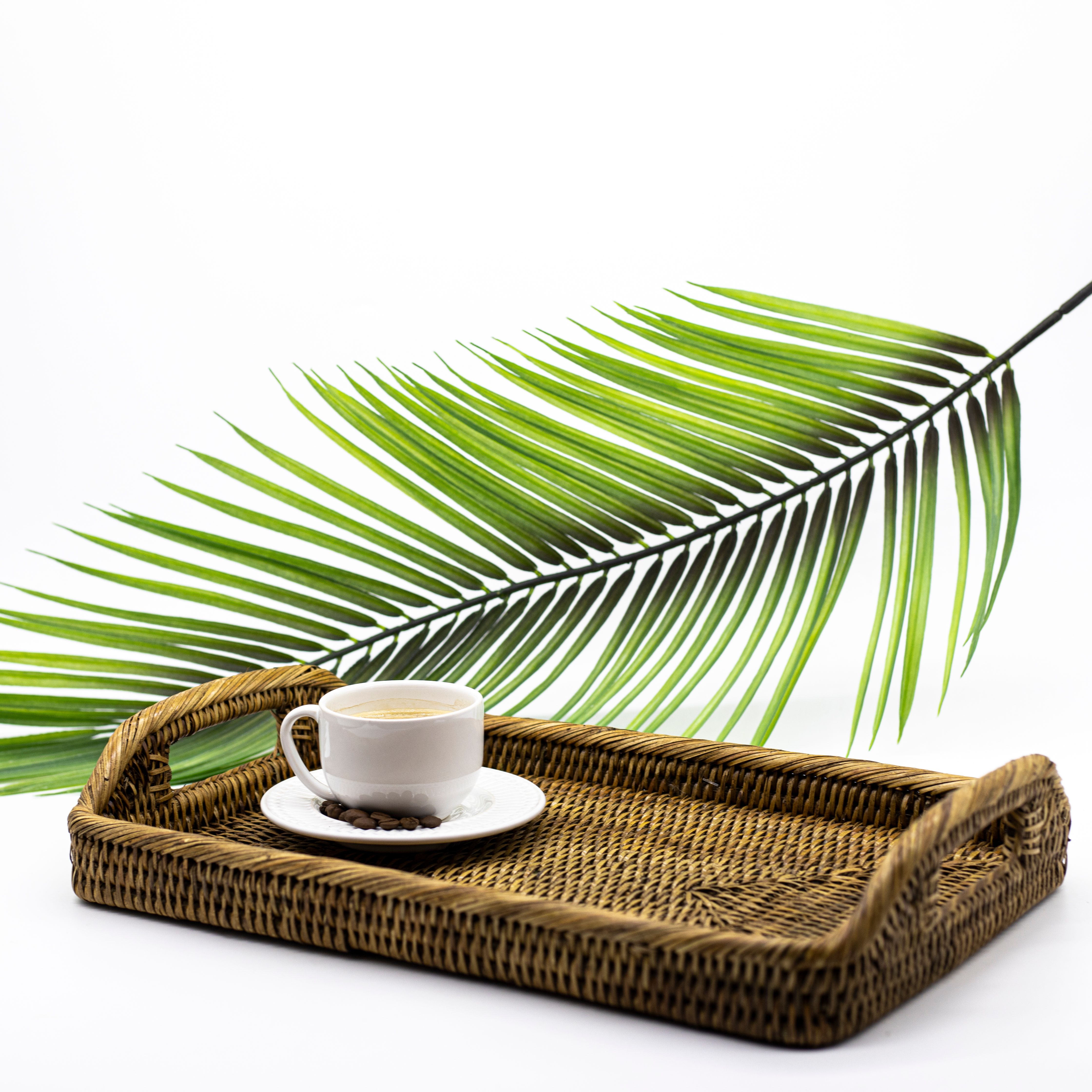 White Ceramic Cup on Brown Woven Tray