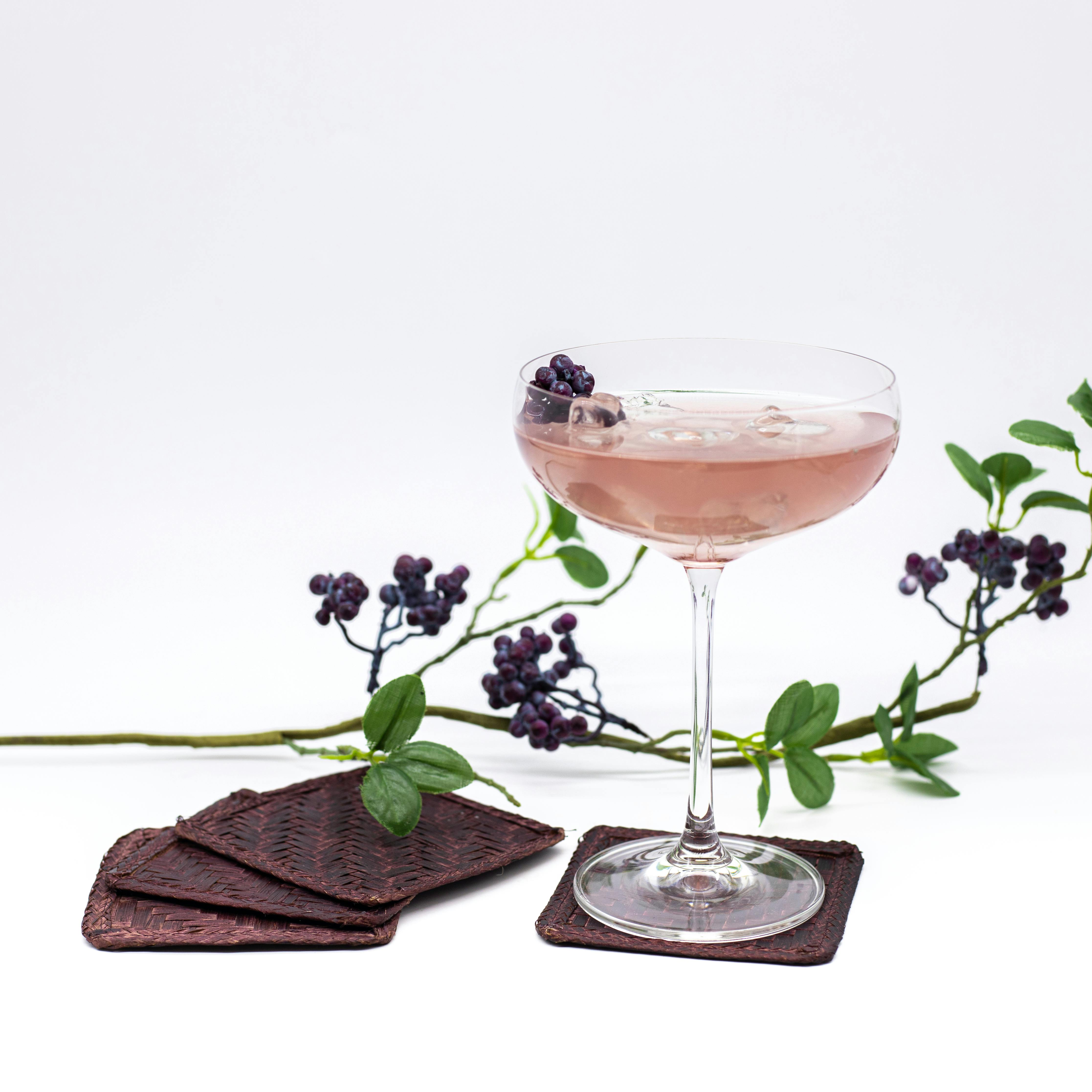 Clear Wine Glass With Pink Liquid Inside