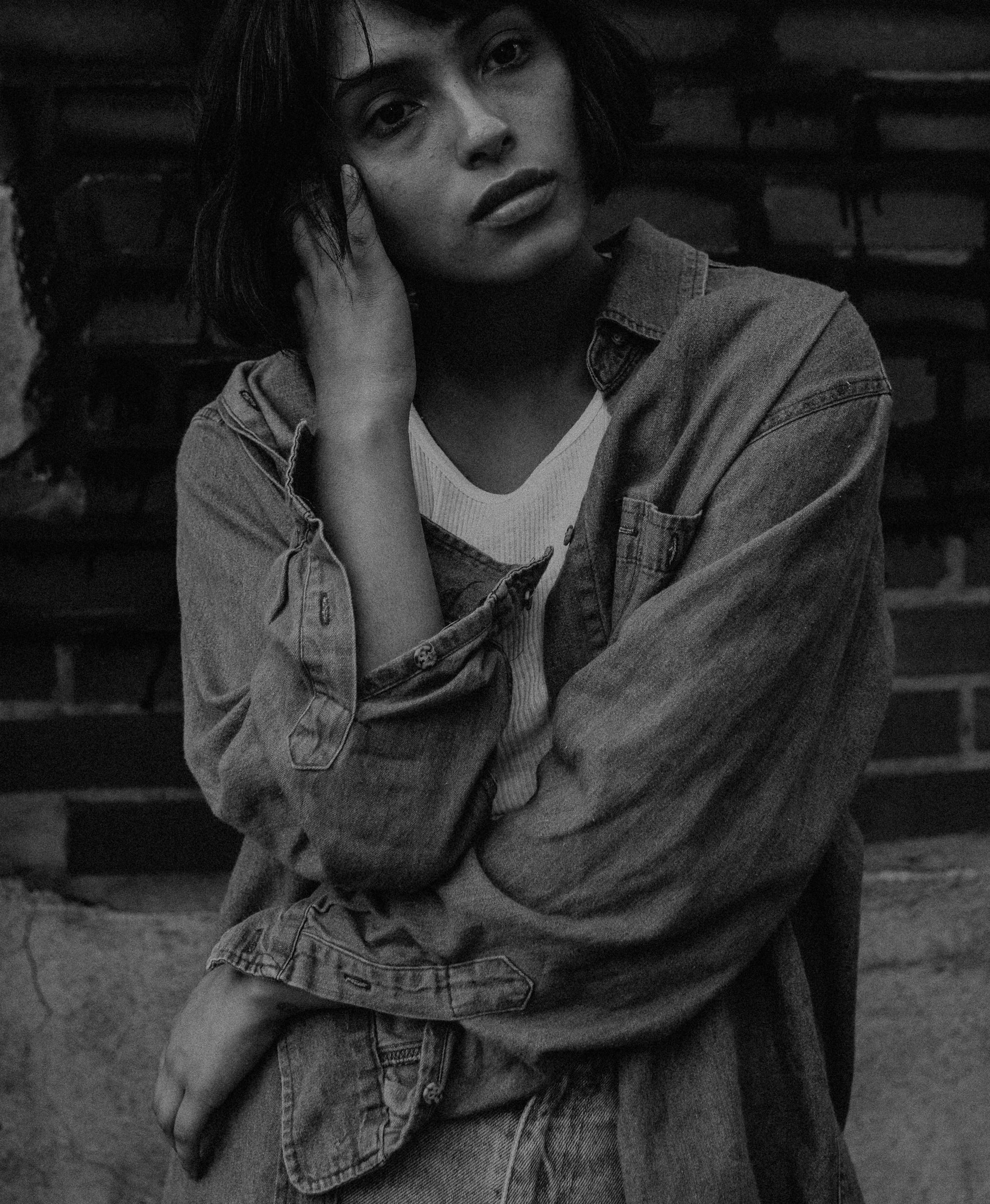 A Woman in Denim Jacket Sitting · Free Stock Photo