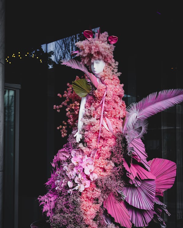 A Mannequin Wearing a Dress Made of Flowers · Free Stock Photo