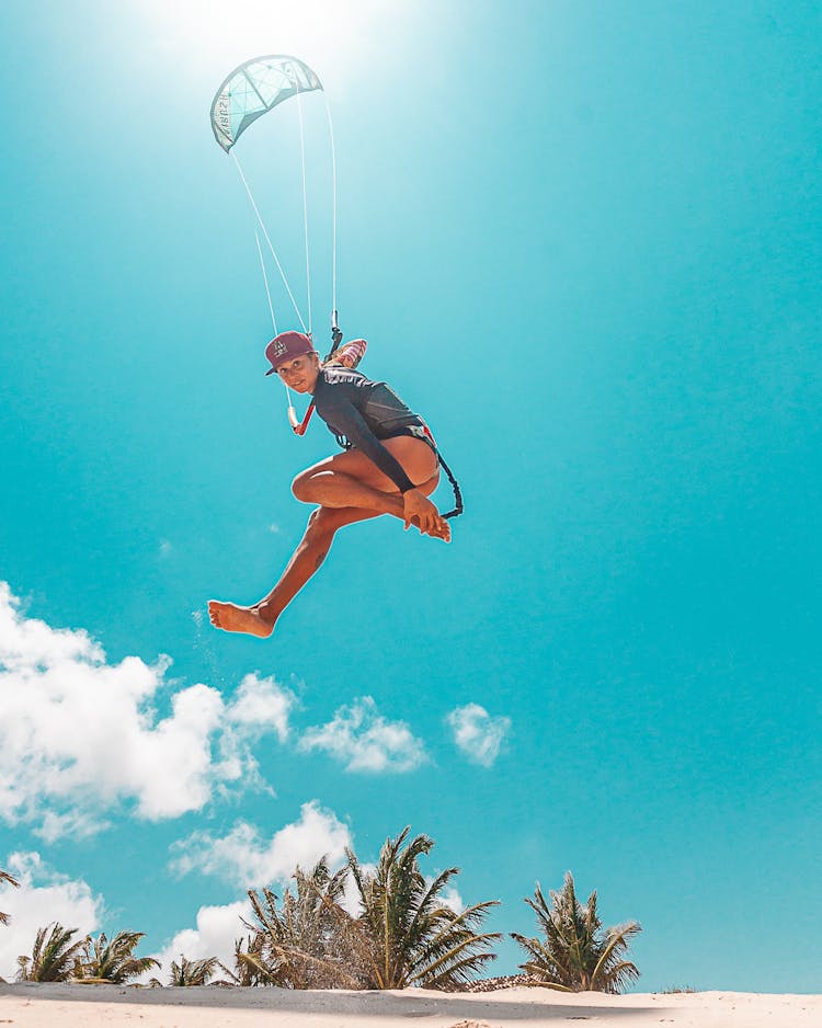 A Woman Doing Kitesurfing