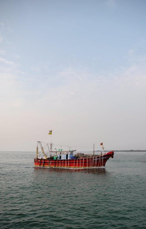 Fishing Boat on Body of Water 