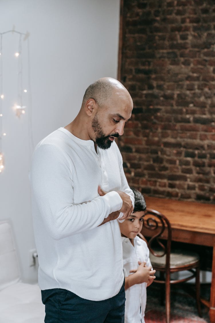 Father And Child Praying Together