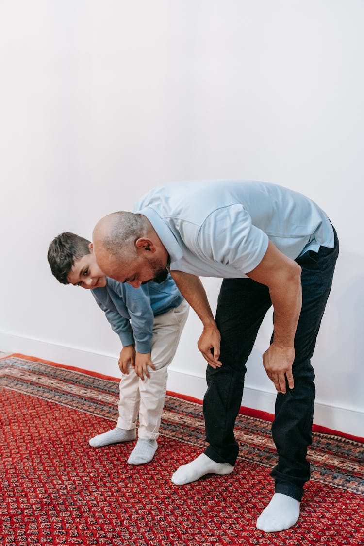 Son And Father In Mosque