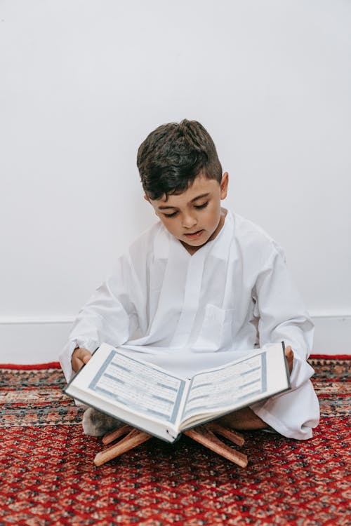 muslim baby boy with quran