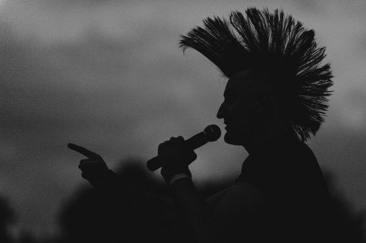 Frame preview of an AI Punk music video — safety pins