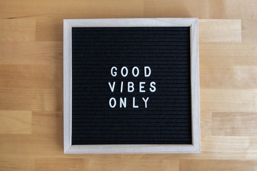 Free A black letter board with white letters displaying a positive message 'Good Vibes Only'. Stock Photo