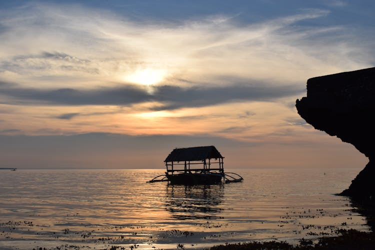 Boat On Sea At Dawn