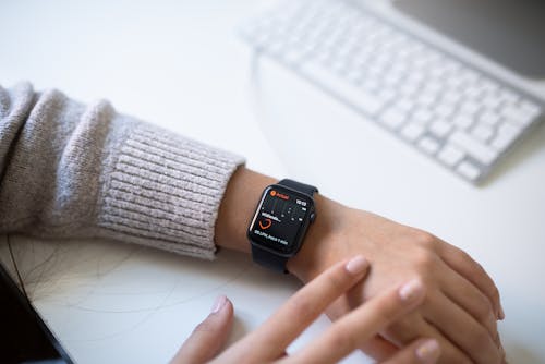 Free A Person Wearing Black Smart Watch Stock Photo