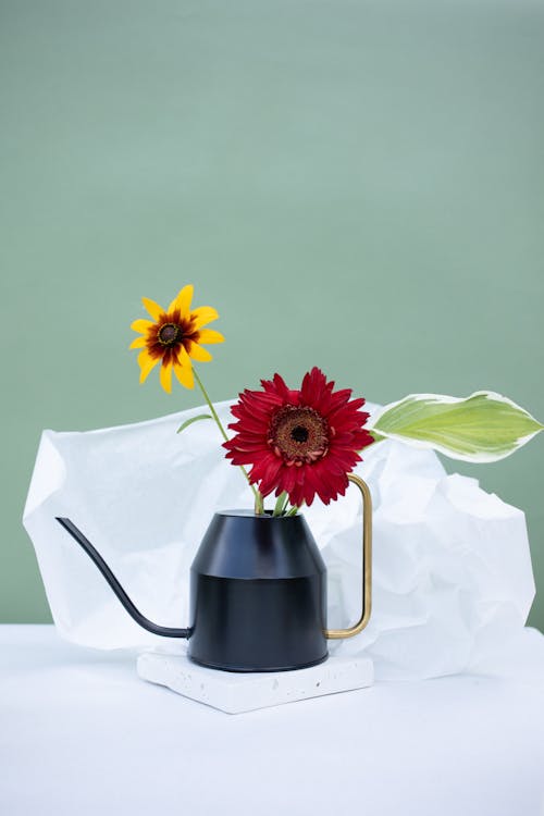 Free Red and White Flower on Stainless Steel Vase Stock Photo