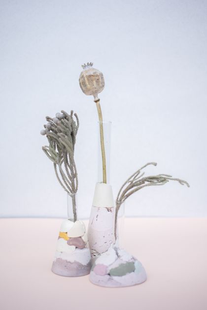 Dried flower stems in a stoneware vase, photo by Katrin Bolovtsova on Pexels