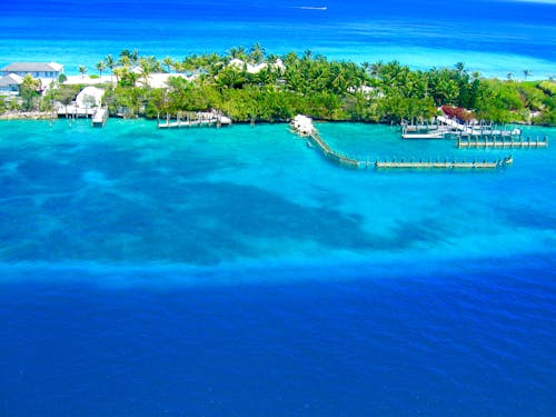 Landscape Photography of Island Surrounded Body of Water