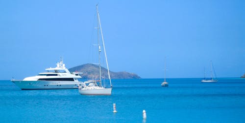 Free Body of Water and White Yacht Stock Photo