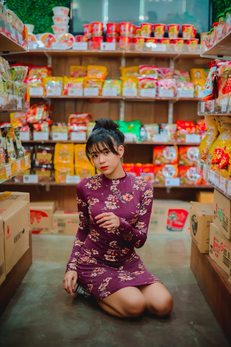 Woman Posing In Dress On Market Floor