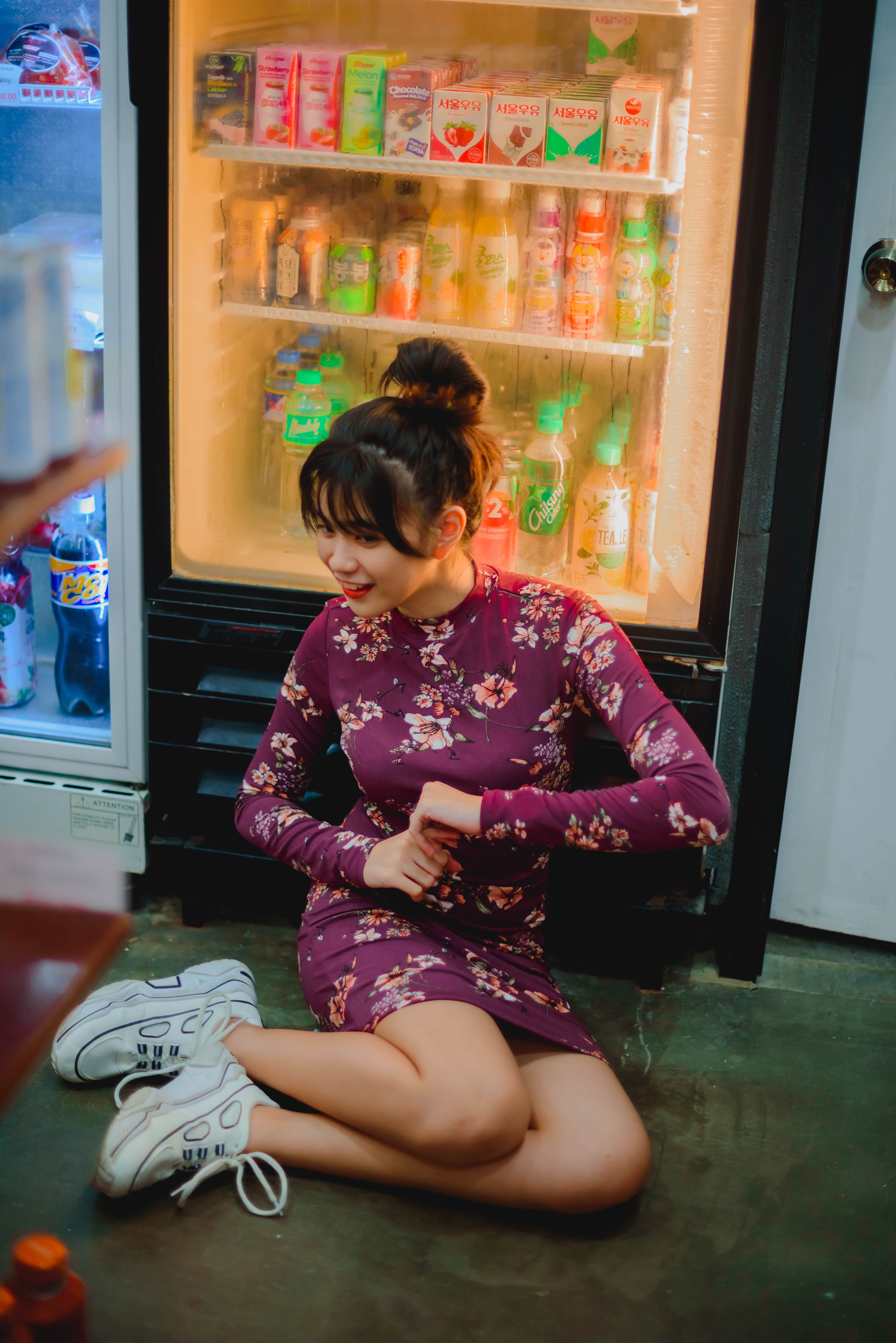 Woman in Floral Dress Sitting on the Floor · Free Stock Photo
